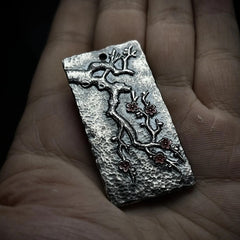 Plum Blossom Relief Pendant